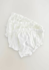 Bijele pamučne šortse s nabranoj elastičnom sasvim udobnom strukom i volanima na rubu. Mekana tekstura i lagani materijal, pogodni za tople dane.