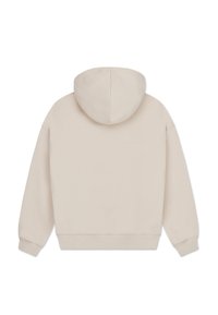 Hanorac oversized bej deschis, cu glugă încăpătoare, manșete și tiv ribbate. Textură netedă, fără modele vizibile sau detalii metalice.