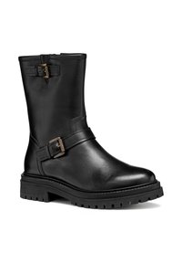 Botín negro de cuero hasta el tobillo con dos hebillas metálicas ajustables, una suela de goma texturizada y punta redonda. Diseño robusto con sutiles detalles de costura.