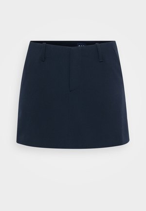 Navy blue skirt with a fitted design, featuring a flat front, belt loops, and no visible pockets. Made from textured fabric.