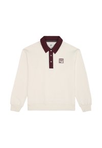 Kerman pitkähiha polo paita, jossa on viininpunainen kaulus, kolme nappia ja pieni brodeerattu logo vasemmassa rinnassa. Sileä kankaan rakenne.