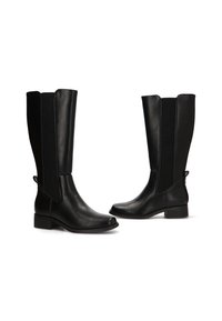Botas de cuero negro hasta la rodilla con paneles laterales elásticos, punta redondeada, tacón bajo y tiras en la parte superior para facilitar su uso. Textura suave en todo el diseño.