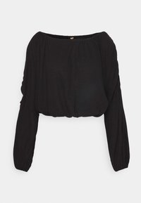 Svart kort blus med en vid, off-shoulder halsringning, långa puffärmar och samlad detalj vid midjan, tillverkad av mjukt tyg.