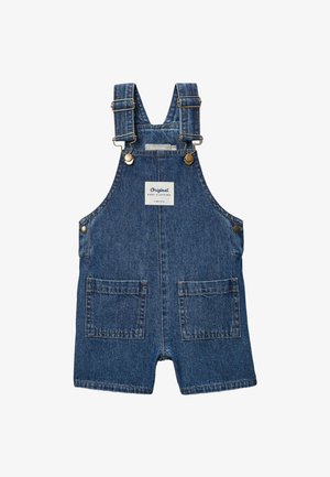 Salopette bébé en denim bleu avec bretelles ajustables, deux poches devant, boutons latéraux et une étiquette "Original Baby Clothing" sur la poitrine.