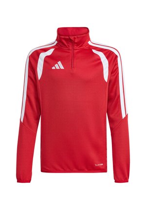 Rød langærmet sportspullover med hvide striber på ærmerne, en kvart lynlås krave og et lille logo på venstre bryst og nederste kant.