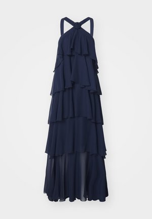 Abito maxi senza maniche di colore blu navy, realizzato in tessuto leggero. Caratterizzato da volants sovrapposti e un dettaglio annodato sul collo.