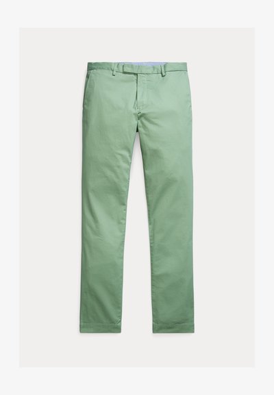 Šviesiai žalios spalvos medvilninės kelnės, tiesaus silueto, su lygiu priekiu ir subtilia tekstūra. Yra diržo kilpos ir sagos užsegimas.