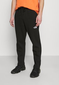 The North Face - STANDARD PANT - Donji dijelovi trenirke - black Minijatura 1