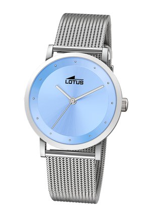 Silver mesh band watch with a round face, blue dial, silver hands, and silver hour markers. Features a logo at 12 o'clock position.