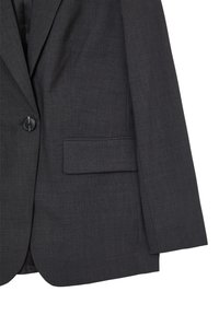 Blazer ajusté gris foncé en tissu texturé. Il présente une fermeture à un bouton, une poche poitrine et des manches droites.