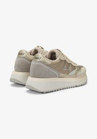 Beige and taupe casual sneakers with textured rubber soles, fuzzy lining, lace-up front, and Sun68 logo on the heel and side.