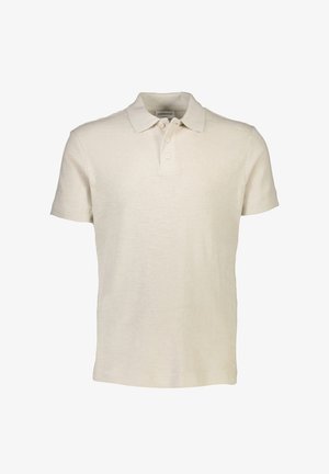 Polo shirt in cream color, made of soft fabric, features a collar, three buttons, and short sleeves with a subtle texture.