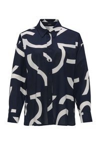 Chemise boutonnée bleu marine ornée de grands motifs abstraits blancs, col classique, manches longues et texture lisse. Des boutons noirs agrémentent le devant.