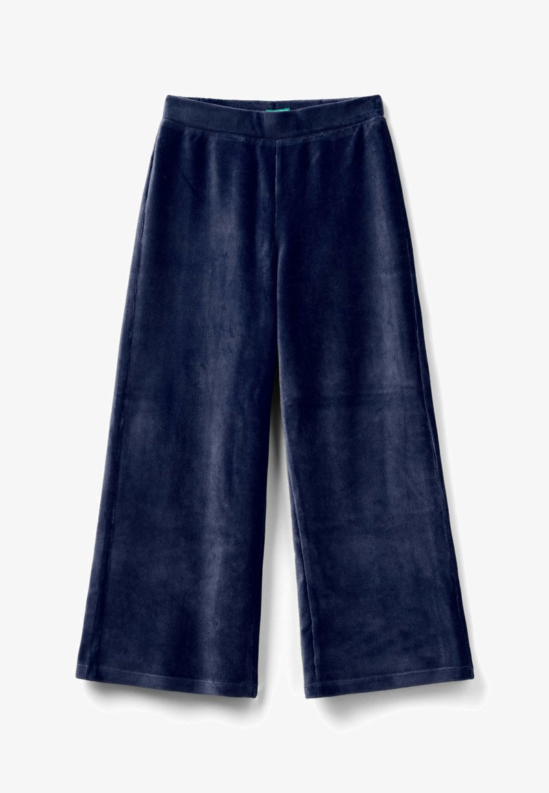 Námořnické modré široké dómské kalhoty z manšestru s elastickým pasem, navržené pro volnočasové nebo pohodlné nošení.