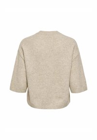 Pull beige en maille à manches courtes avec un col rond et une coupe légèrement ample, vu de dos.