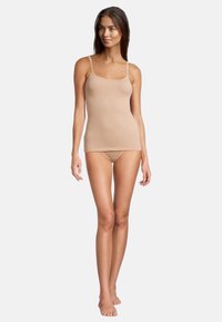 Beige sleeveless tank top with thin straps, made of soft, smooth fabric, fitted design, pairs with matching low-rise underwear.