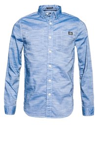 Jasnoniebieska koszula z długim rękawem z mieszanki bawełny, z dwoma kieszeniami na piersi, z zapięciem na guziki i subtelnym wzorem teksturowym.