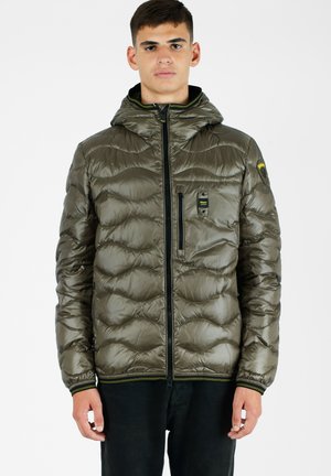 Olive green, quilted puffer jacket with a hood, front zip, and chest pocket; features black zipper and yellow accents.