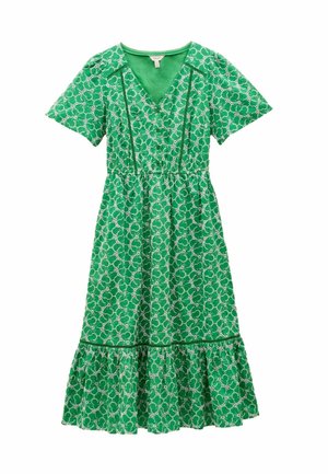 Zelené šaty s krátkým rukávem, V výstřihem, elastickým pasem a vrstveným volánkovým lemem. Mají bílý květinový vzor a hladkou texturu.