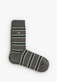 Gestreifte Socken aus grauem Stoff, mit grünen und cremefarbenen horizontalen Streifen, geripptem Muster und einem kleinen Totenkopf-Logo-Detail.