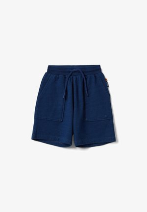 Marineblauwe katoenen korte broek met elastische tailleband, voorste trekkoord en twee grote voorzakken, geïsoleerd op een witte achtergrond.