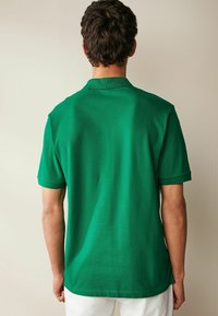 Next REGULAR - Poloshirts - green tennis