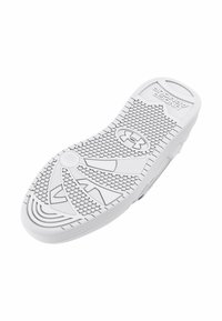 White athletic shoe sole featuring a textured rubber surface with circular and angled patterns. Includes the Under Armour logo.
