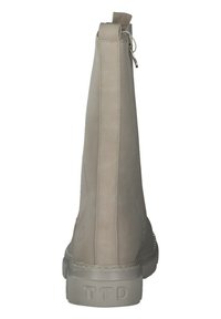 Beige ankle boots with a smooth, leather-like finish. Features a side zipper and textured sole with embossed "TTD" detail at the heel.