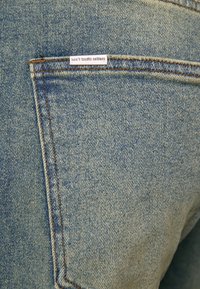 Don't Waste Culture ZIGA UNISEX - Calças de ganga folgadas - ocean sand