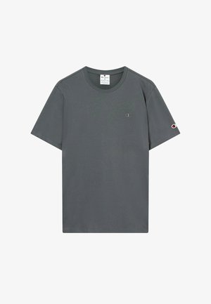 Graues kurzes Champion-T-Shirt mit kleinem Logo auf der Brust und dem Ärmel, Rundhalsausschnitt und sichtbarem Markenetikett im Kragen.