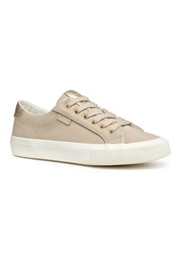 Beige kanvas joggesko med gulløyler, rund tåhette og hvit gummisåle med horisontale riller. Snøringer for sikker passform.