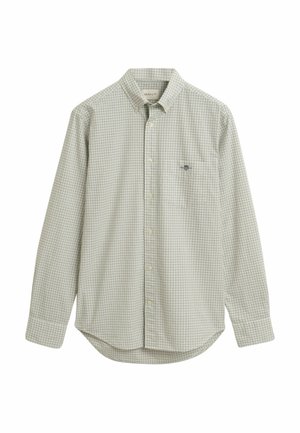 Vihreä ruudullinen nappikauluspaita, joka on valmistettu puuvillasta. Siinä on kauluskotti, pitkät hihat ja rintatasku, jossa on logotehoste.