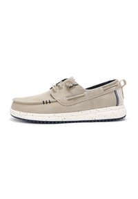 Beige canvas boat shoes with a rounded toe, contrasting navy interior, two pairs of eyelets, and a speckled white sole. Here's a textured design.