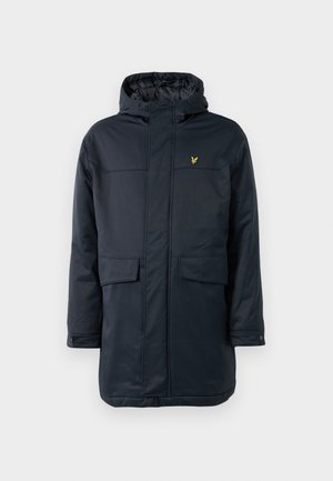 Manteau isolé bleu marine avec capuche, comportant deux poches avant, un logo discret sur la poitrine et une texture extérieure lisse.