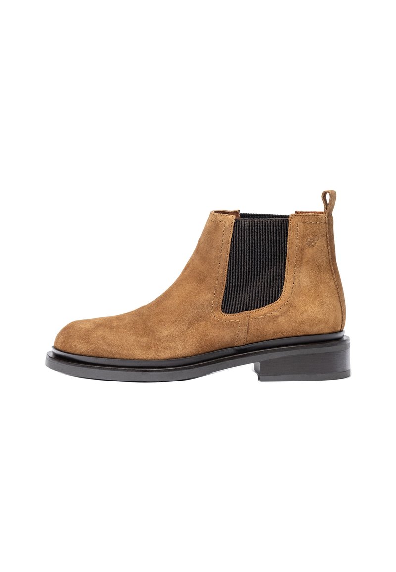 Brown suede ankle boot with black elastic side panels, pull tab at the back, and a flat black rubber sole. Smooth texture with no patterns.