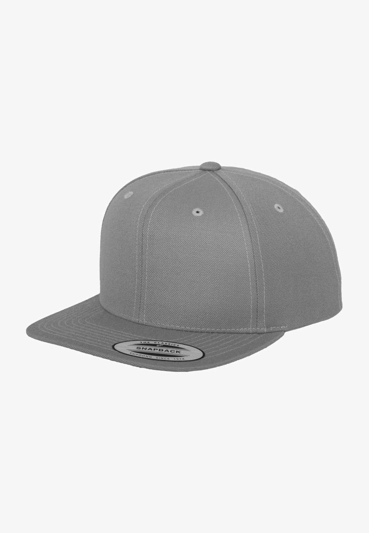 Gray snapback cap made of structured fabric with a flat brim, six-panel design, and a circular label on the front.