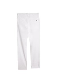 Bílé bavlněné kalhoty s rovný střihem, vybavené dvěma zadními kapsami, ohrnutými nohavicemi a malým logem na zadním pásku.