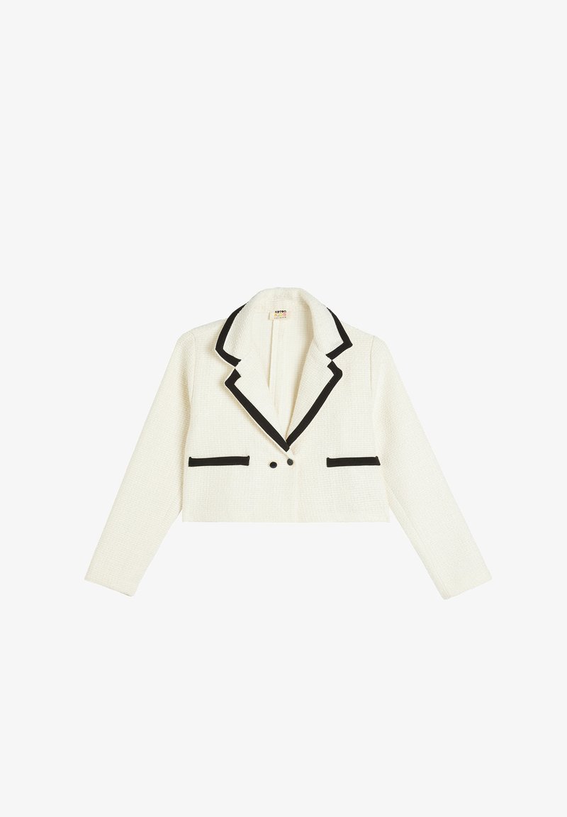 Gekürzte weiße Blazerjacke mit schwarzem Besatz, spitzem Revers, zwei vorderen Taschen und doppeltem Knopfverschluss. Texturierter Stoff mit gewebtem Muster.