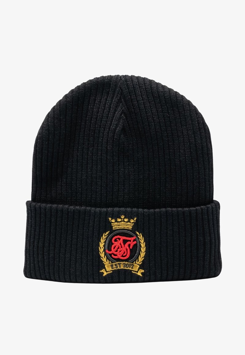 Fekete bordás sapka kötött anyagból. Piros és arany hímzett logóval rendelkezik, koronával és babérlevelekkel díszítve.