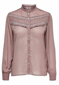 Long-sleeve, mauve blouse with textured polka dots, ruffled collar, and button-down front. Decorative lace band across the chest. Soft, sheer fabric.