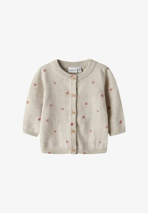 Cardigan beige per bebè con maniche lunghe, bottoni in legno sul davanti e piccoli motivi floreali rossi sparsi sul tessuto.