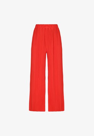 Red pleated wide-leg pants with an elastic waistband, made from lightweight material, featuring deep vertical grooves for texture.
