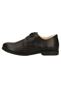Chaussure habillée en cuir noir avec une finition lisse et mate, bout arrondi et système de laçage. Elle dispose d'un talon bas et d'un minimalisme dans les détails.