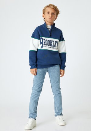 Vaqueros slim fit - light blue denim