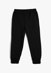 Zwarte joggingsbroek van zachte stof, met een elastische tailleband en gathered cuffs bij de enkels voor een strakke pasvorm.