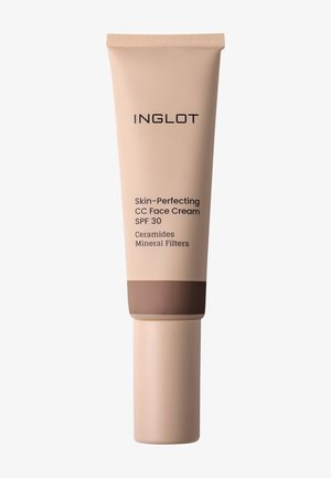 Tube de crème pour le visage CC Skin-Perfecting Inglot avec SPF 30, contenant des céramides et des filtres minéraux, emballage beige avec bouchon marron.