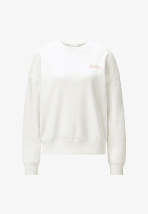 Bijela majica dugih rukava s okruglim izrezom i rebrastim manšetama, s malim kursivnim natpisom "Bellini" na gornjem lijevom dijelu prsa.