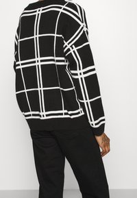 Roxy Trui - black