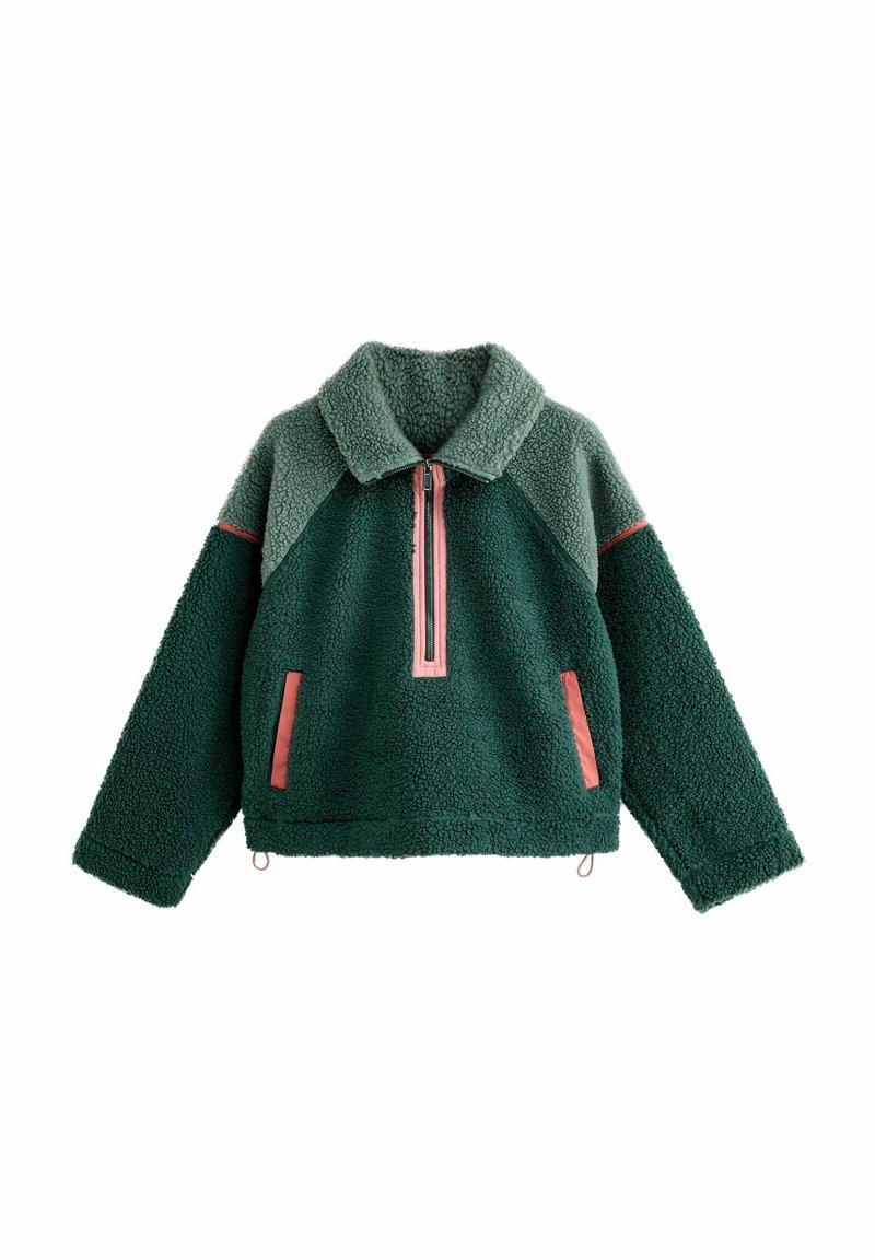 Roheline fliisist pullover kõrge krae, pool lukuga ja roosade aksentidega. Omaduseks on tekstuuriga pind ja kaks esikäepaari kontrastset ääristust.