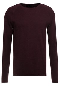 Maglione lungo bordeaux con maniche lunghe e scollatura rotonda, motivo a maglia lavorato e polsini a coste. Presenta un design sobrio e informale.